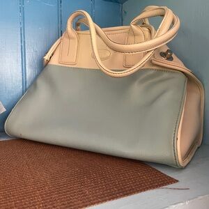 Tods baby blue and white bag. Like new condition.
